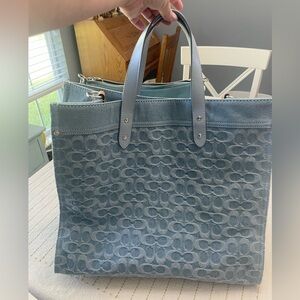 Coach Tote 40 in Signature Denim and refined calf leather.